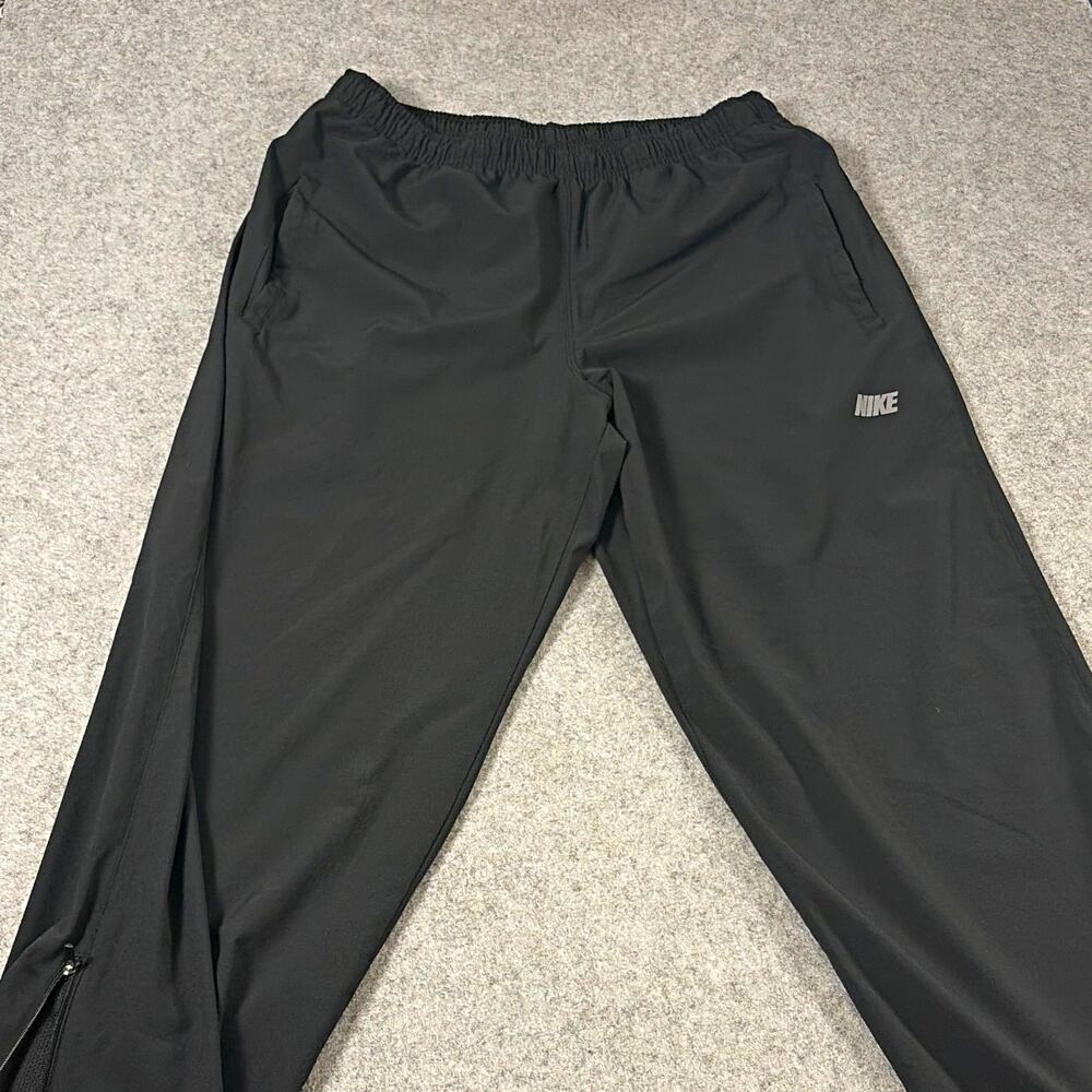 Nike Men's Black Track Pants L Tapered Leg Elastic Waist Zip Pockets 30"